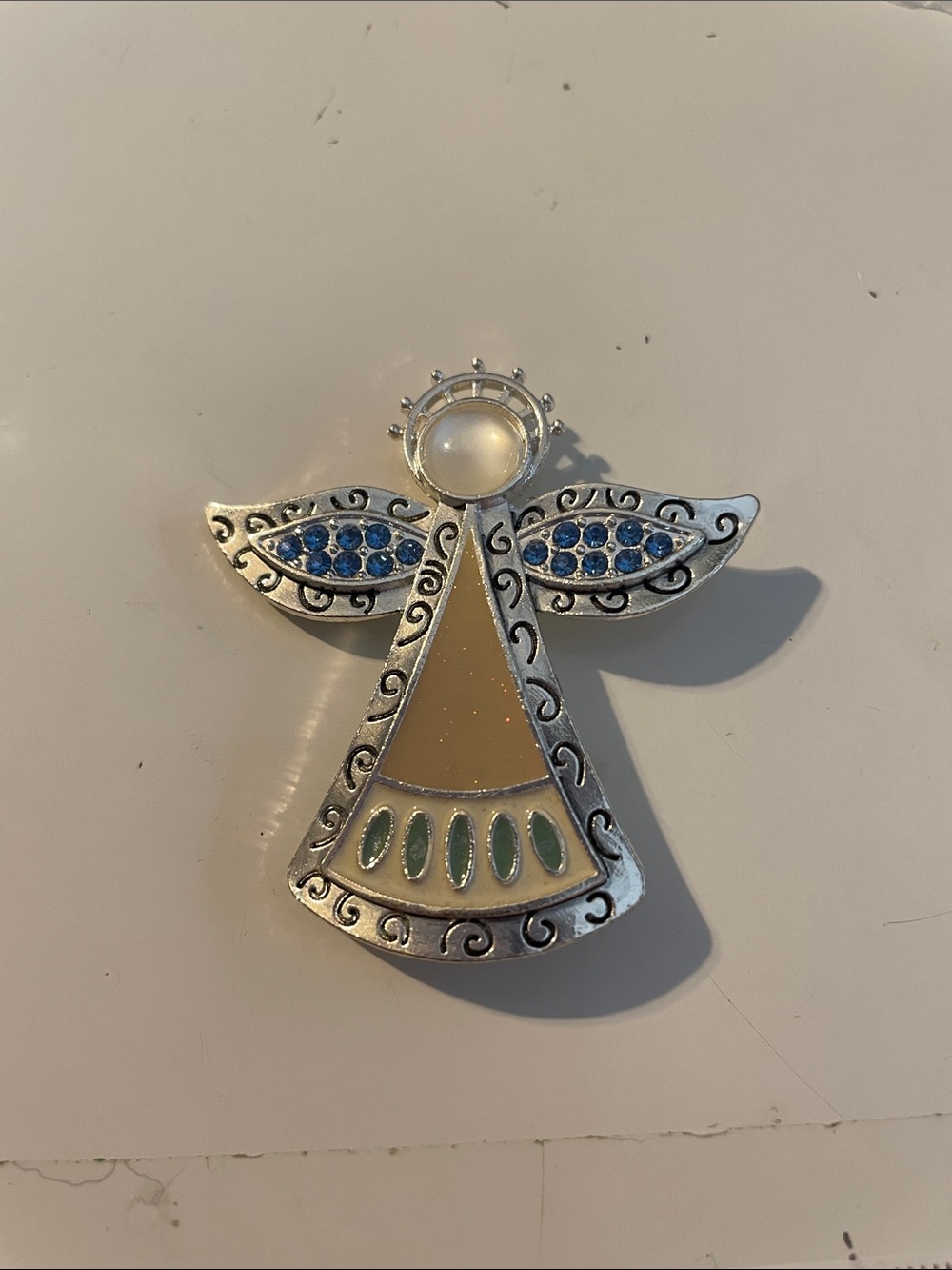 Silver-tone Angel Pin with Blue and Cream Accents